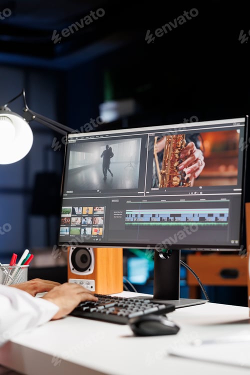 Preview: Man working with video footage and sound