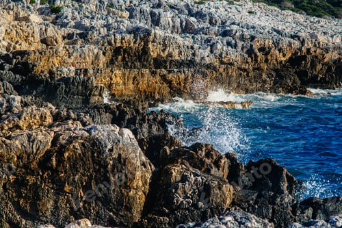 Preview: The waves of the sea on the stony beach of Kefalonia