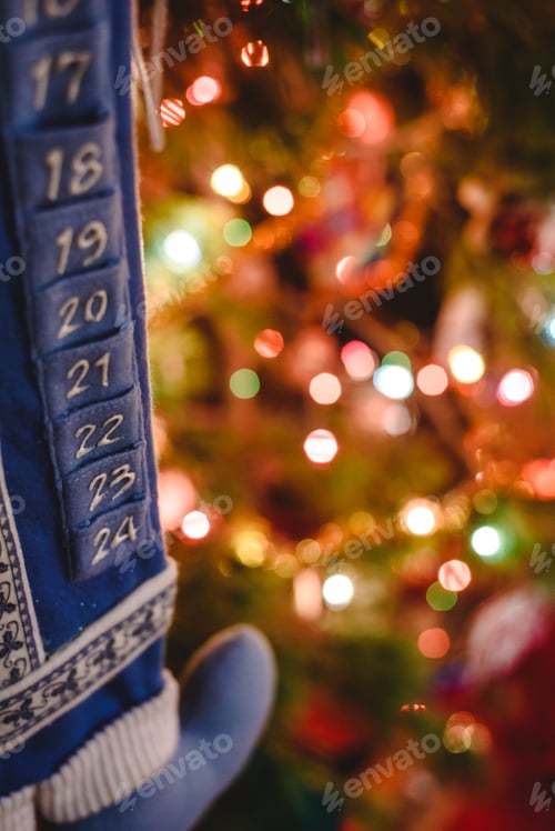 Preview: Christmas advent embroidery calendar with luminous lights background.