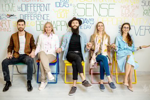 Preview: Group of diverse people on the white wall background