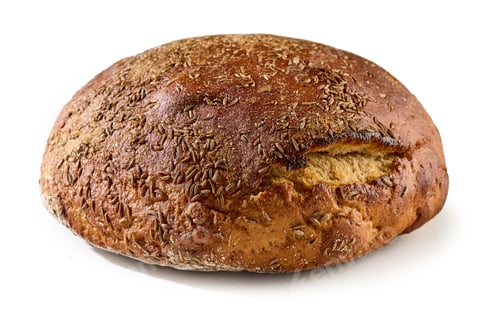 Preview: Homemade fresh baked sweet and sour rye bread loaf with caraway seeds isolated on white background