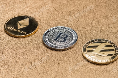 Preview: Cryptocurrency litecoin,Silver Bitcoin,Ethereum on golden rough background
