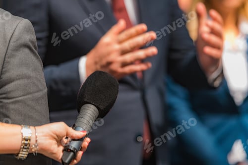 Preview: Journalist Conducting an Interview, Politician Answering Questions.