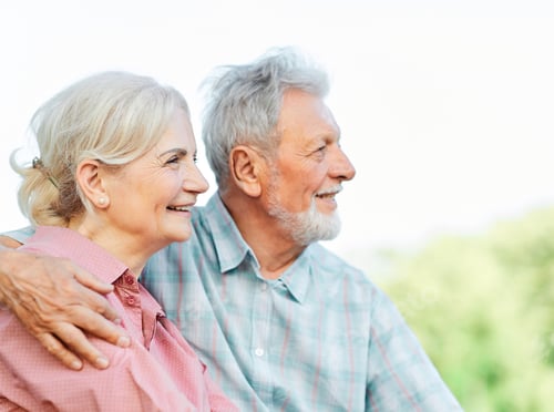 Preview: Happy Senior Couple Smiling Outdoors with Arm Around