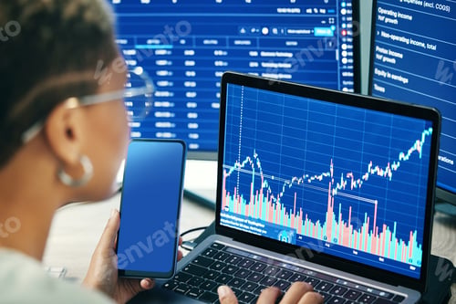 Preview: Woman, phone and laptop on stock market in fintech, trading or online business finance at office. F