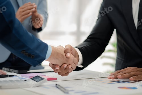 Preview: Two businessmen holding hands, Two businessmen are agreeing on business together and shaking hands a