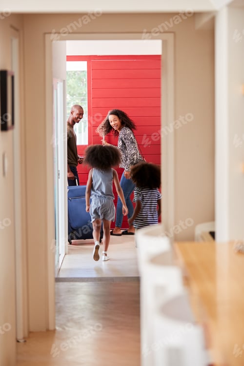 Preview: Family Arriving Home After Vacation With Luggage