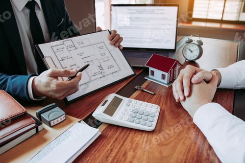 Real Estate Agreement Discussion in Modern Workplace