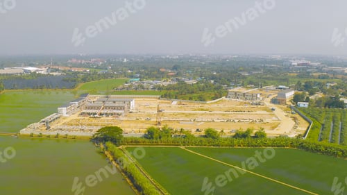 Preview: Dry ground rough cracks in the land with sand in factory industry for construction site.