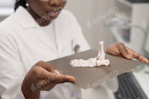 Preview: Technician Holding Print Bed with 3D Anatomical Sample