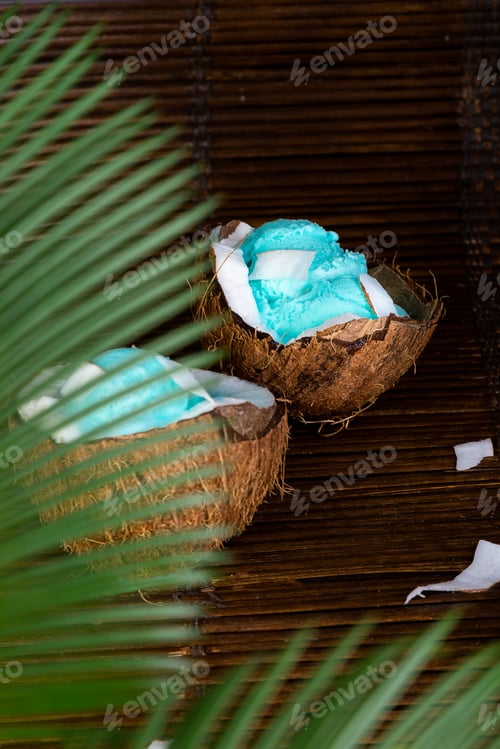 Preview: Blue ice cream in coconut bowl.
