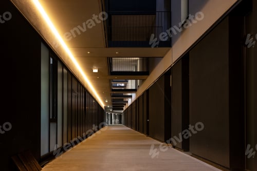 Preview: Interior of the corridor in an office space with black walls and balconies