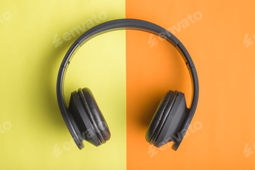 Preview: Headphones on double colorful background.