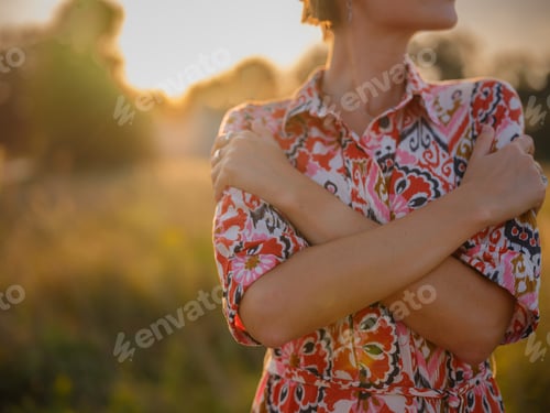 Preview: boho chic woman in a floral dress in European countryside
