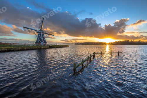 Preview: wooden windmill on the waterfront