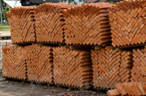 Preview: pallets and packages of freshly produced red bricks