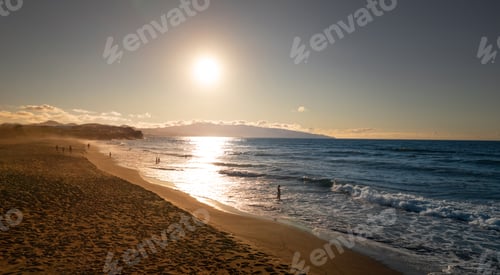 Preview: Scenic view of seashore in sunset
