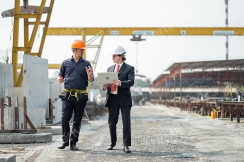 Preview: Male engineers are inspecting and controlling the work of the employees