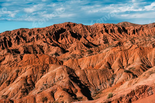 Preview: Landscape of eroded red sandstone mountain and rugged ridge during evening in Fairytale Canyon