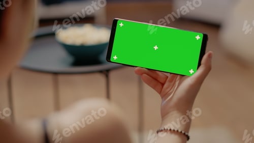 Preview: Close up of horizontal smartphone with green screen