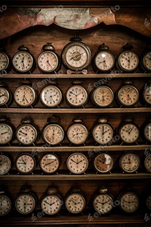 Preview: Vintage alarm clocks on a wooden shelf