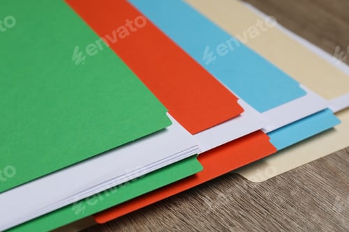 Preview: Many documents in folders on wooden table, closeup