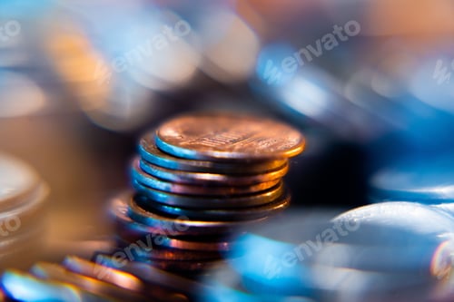 Preview: Nickels dimes and quarters with a shallow depth of field and selective focus about to collapse
