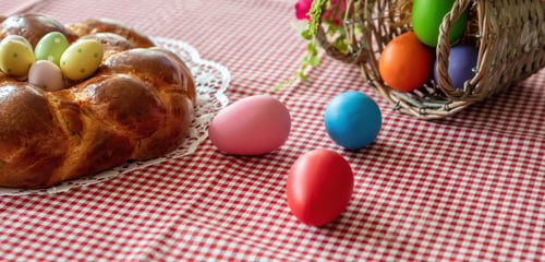 Preview: Easter sweet bread, greek tsoureki, brioche braid on table, close up view