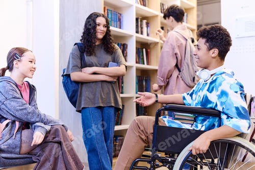 Preview: Middle Eastern Boy with Disability Talking To Friends in School