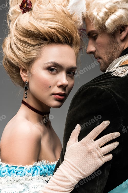 Preview: attractive victorian woman in wig hugging handsome man isolated on grey