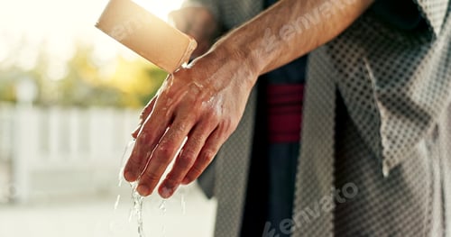 Preview: Shinto temple, person and washing hands at fountain with container for cleaning, faith and worship.