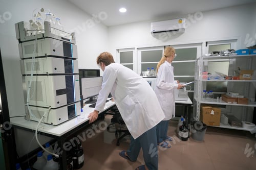 Preview: Scientists conducting research in a modern laboratory during daytime hours