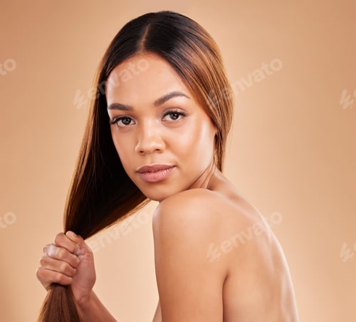 Preview: Woman, beauty and hair care portrait for growth and shine shampoo on a brown background. Aesthetic