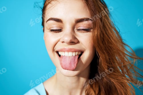 Preview: portrait of a woman in fashionable glasses blue background Lifestyle