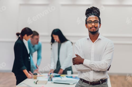 Preview: Portrait of a an arabic businessman posing during a meeting in the office