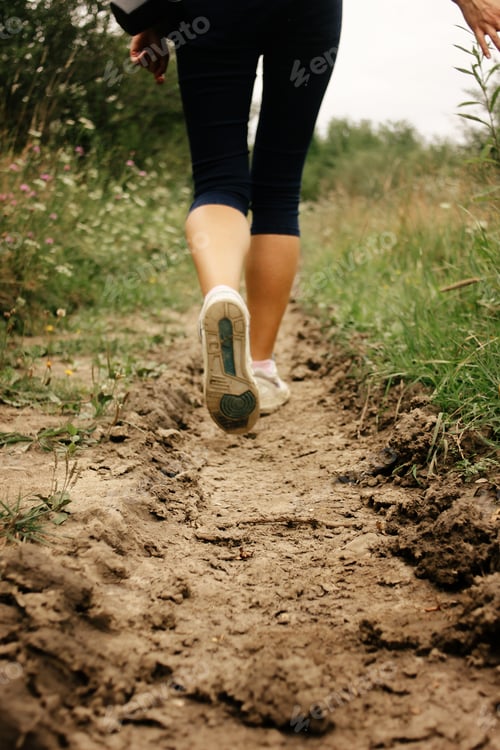 Preview: stylish woman legs in sneakers walking on ground, exercise outdoors