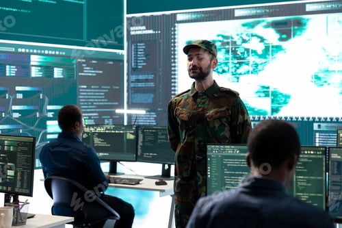 Preview: Military personnel working in a government cyber defense center