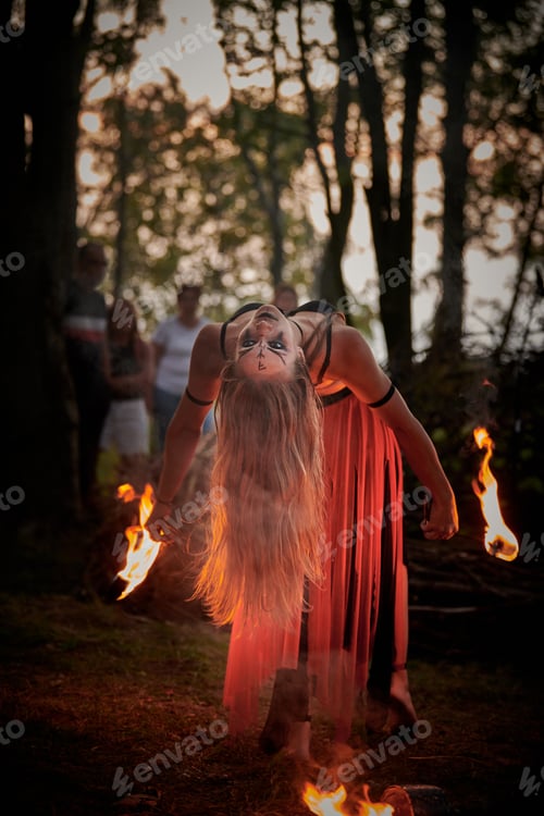 Preview: Girl fire dancing performance at outdoor art festival, smooth movements of female artist