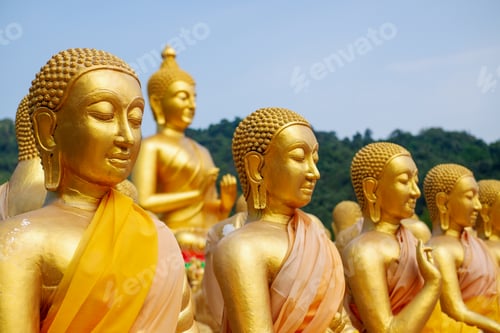 Preview: The big golden Buddha statue among many small Buddha statues