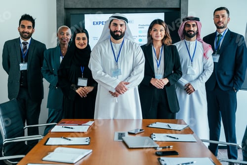 Preview: Multiethnic business team posing in dubai office meeting room