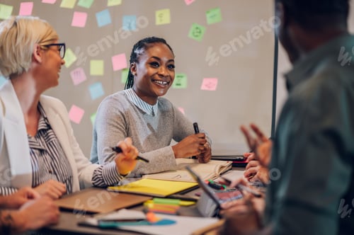 Preview: Multiracial business team working together and having a meeting in the office