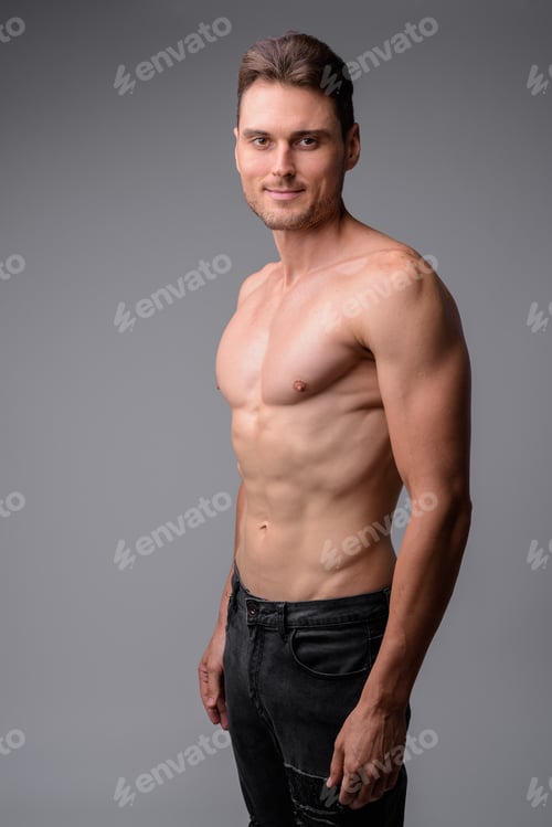 Preview: Studio shot of handsome muscular man shirtless