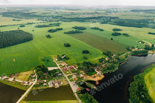 Preview: view from the height of the Lake in a green field in the form of a horseshoe and a village in the