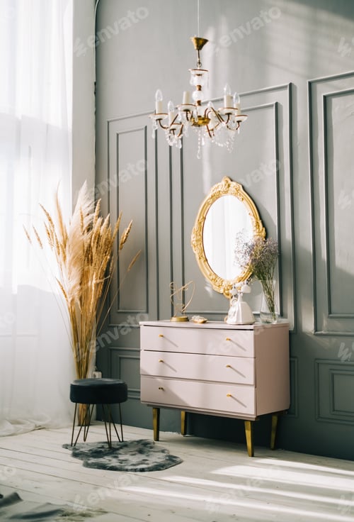 Preview: Interior of contemporary living room with dresser and vintage mirror on a wall.
