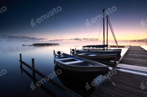 Preview: misty sunrise on lake harbor