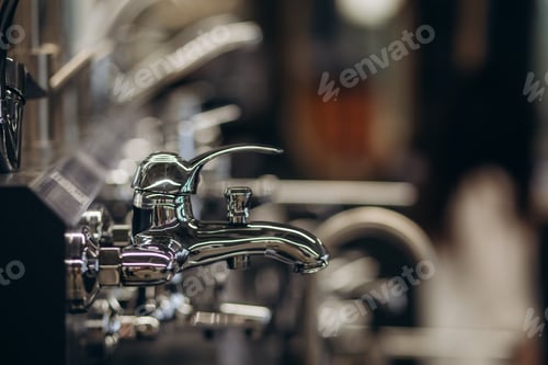 Preview: Modern kitchen water faucets in the store