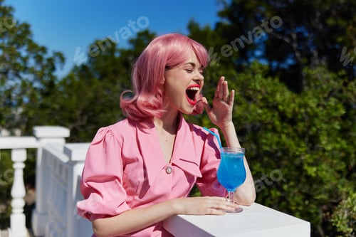 Preview: cheerful woman with pink hair summer cocktail refreshing drink Happy female relaxing