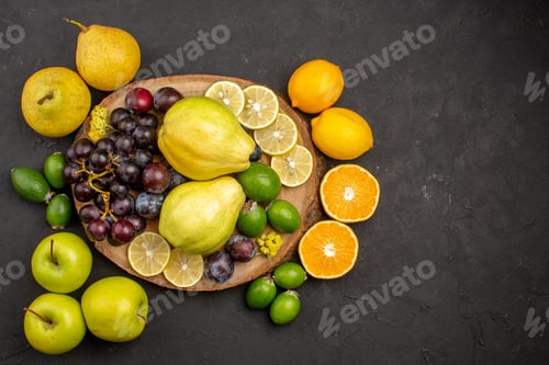 Vista previa: top view fresh fruits composition mellow and ripe fruits on dark background fruit mellow ripe