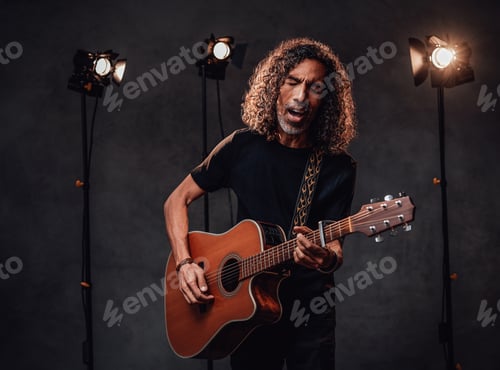 Preview: Man Sings and Plays Acoustic Guitar