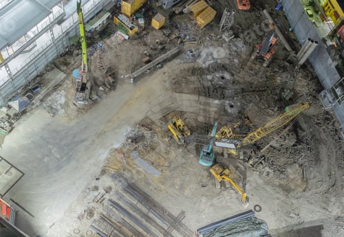 Preview: Busy industrial under construction site workers working and excavators. Top view of precast concrete